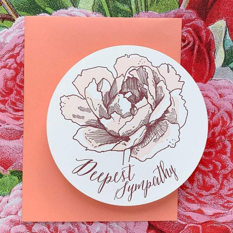 Circle card letterpress printed pink and red with a rose and deepest sympathy text -close- Austin Gift Shop
