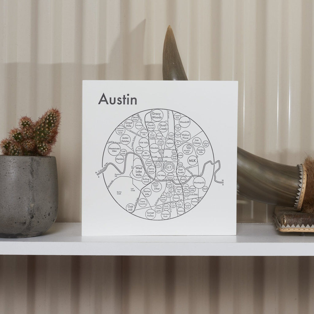 White and black letterpress of Austin Texas neighborhoods map print - shelf - Austin Gift Shop