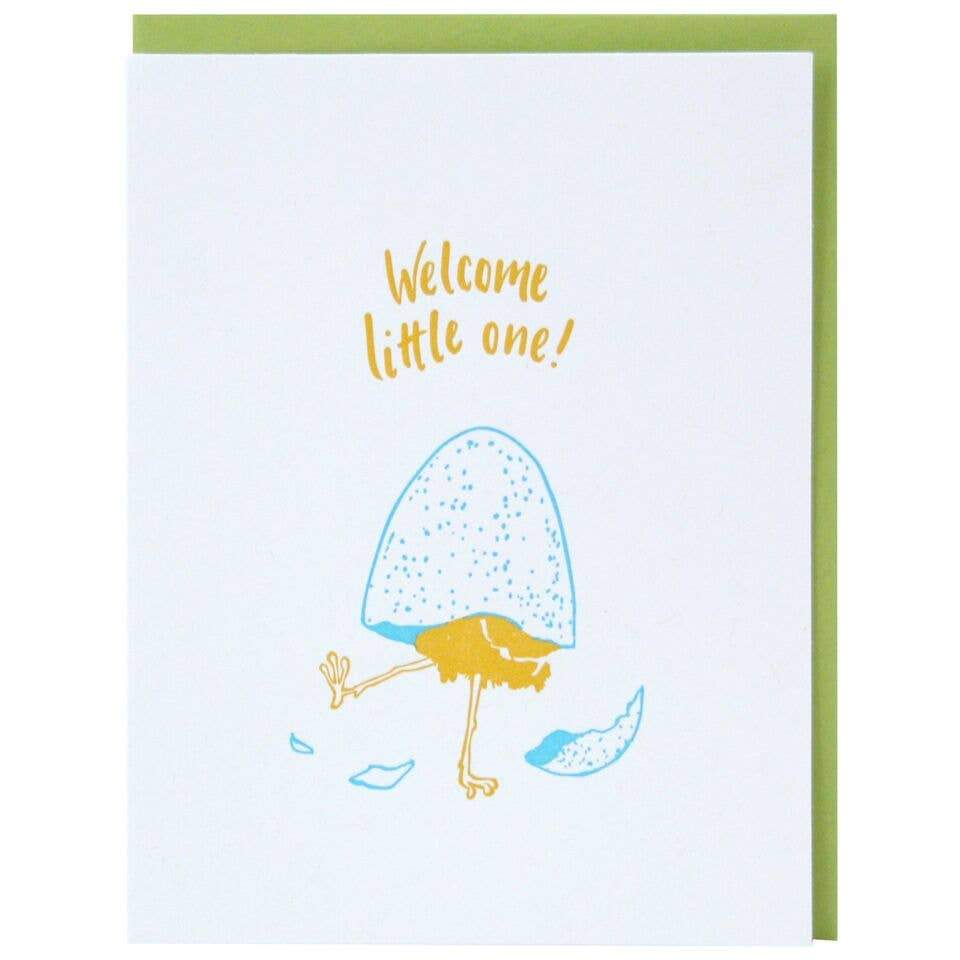 Blue and yellow letterpress baby greeting card with hatching chick and welcome little one text