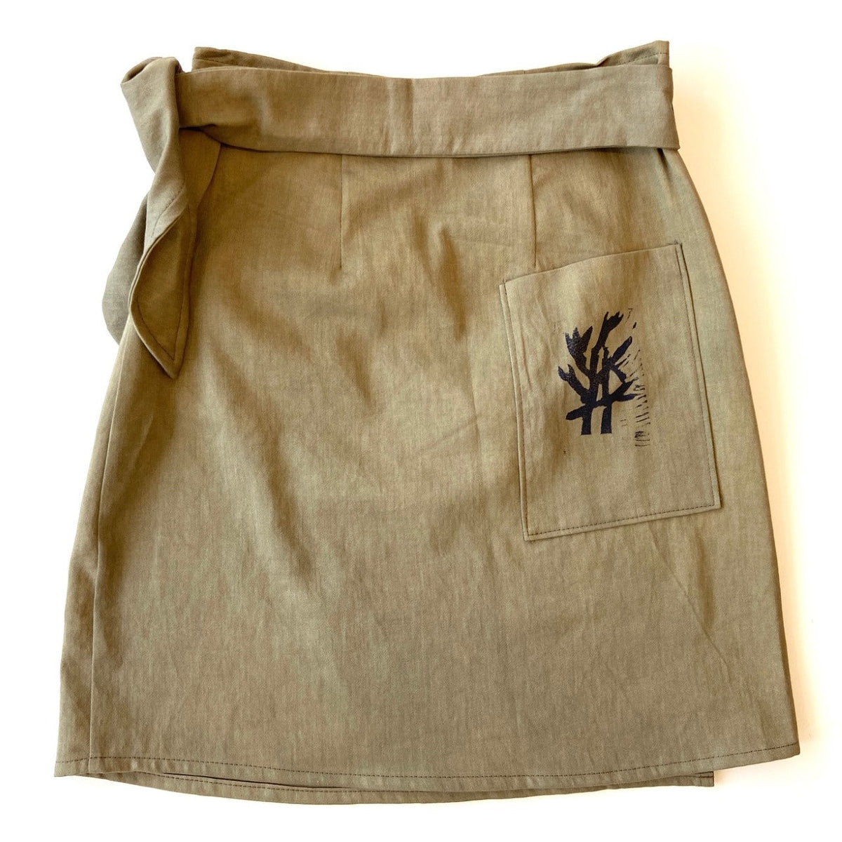 Green hand dyed utilitarian Wrap Skirt with block printed wildflowers - back - Austin Gift Shop